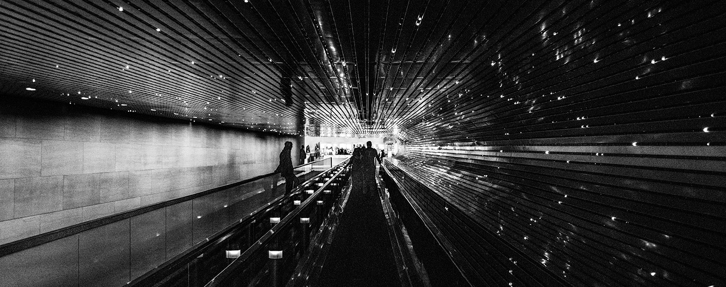Will Web3 save liberal democracy? People walking on a walkalator. Photo: David Yu